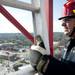 Emergency rescue technician Erik Marshal climbs a crane ladder to simulate a rescue mission on Sunday. Daniel Brenner I AnnArbor.com